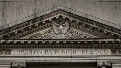 brown concrete building with statue