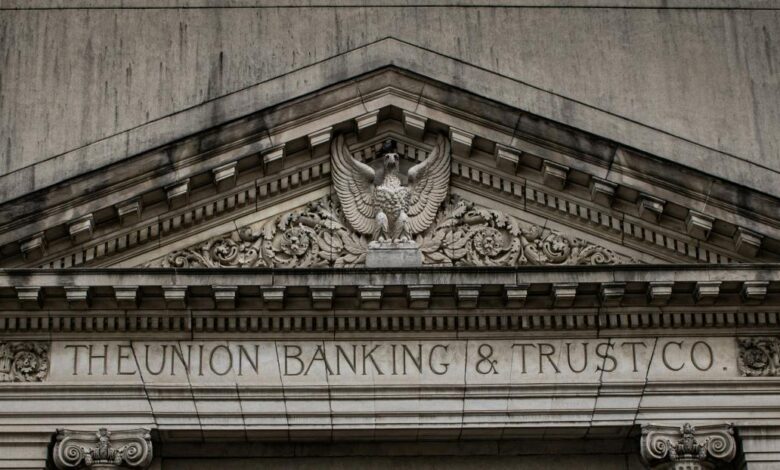 brown concrete building with statue