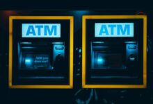 a couple of atm machines sitting next to each other