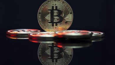 a bit coin sitting on top of a table